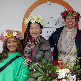 Three woman with flower crowns 